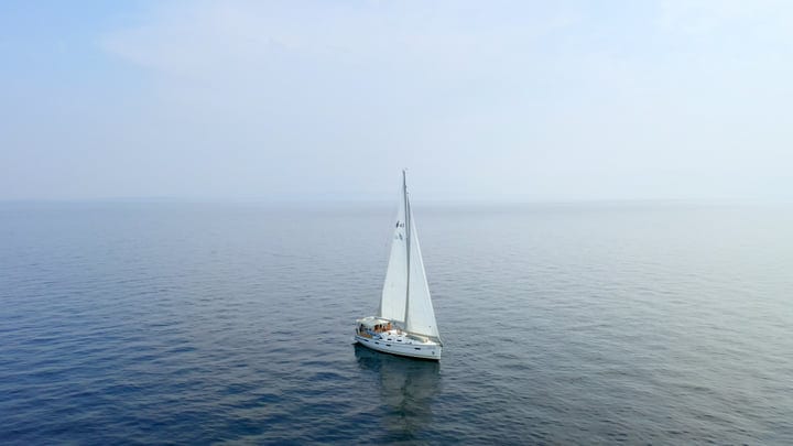 Serenity Sails Through The Turquoise Bay Blissfully