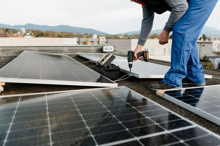 Harnessing Solar Power On A Rooftop In Autumn Light
