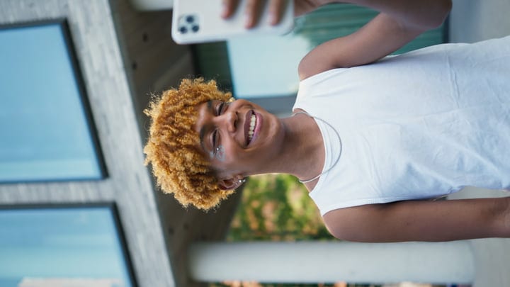 Youth Captures A Joyful Selfie In The City Streets